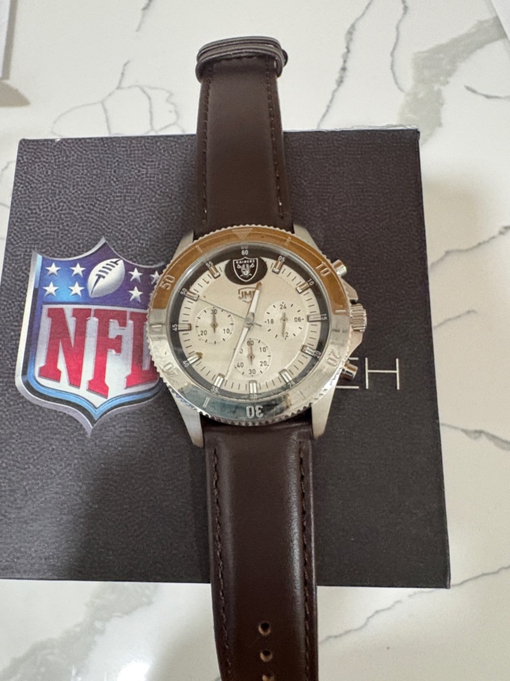 NFL Oakland Silver Dial Watch with Brown Strap